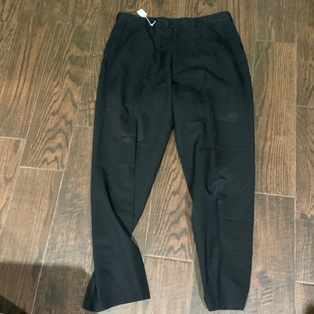 Black Hagger golf pants size is not on there but fits like a 36